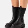 WINTER BOOTIES - Plateaustiefel - Black